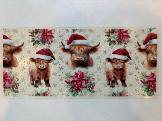 Santa hat highland cow